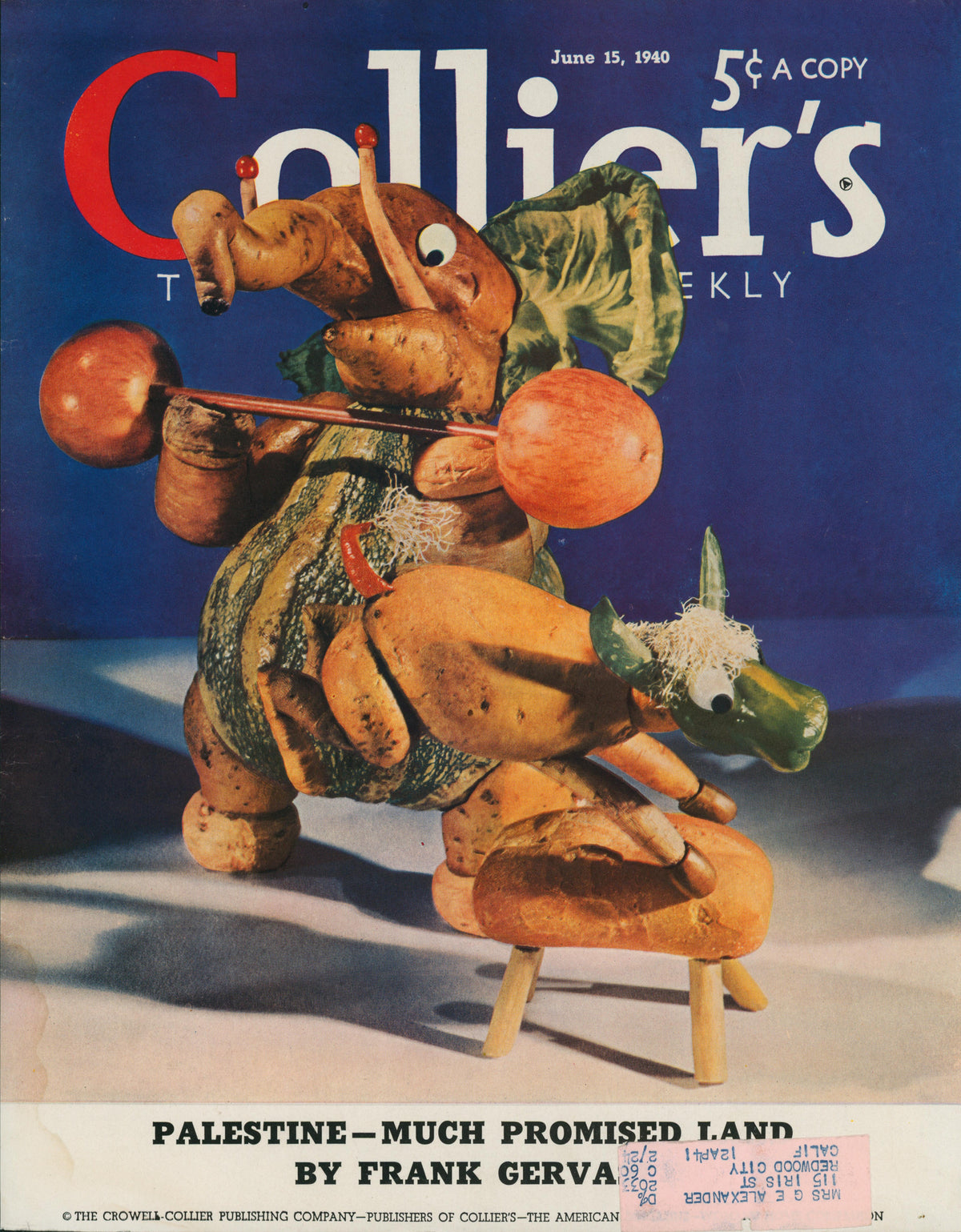 26- Collier's Magazine: Vintage June 15, 1940 cover art featuring an elephant crafted from vegetables and toothpicks playing drums, beneath the headline "Palestine—Much Promised Land." Collectible magazine artwork.